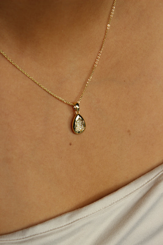 Glow Within Pendant Necklace on a model's neck