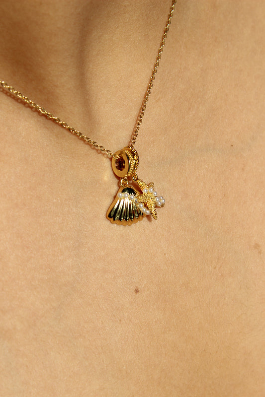 Shore Whispers Charm Necklace on a model's neck