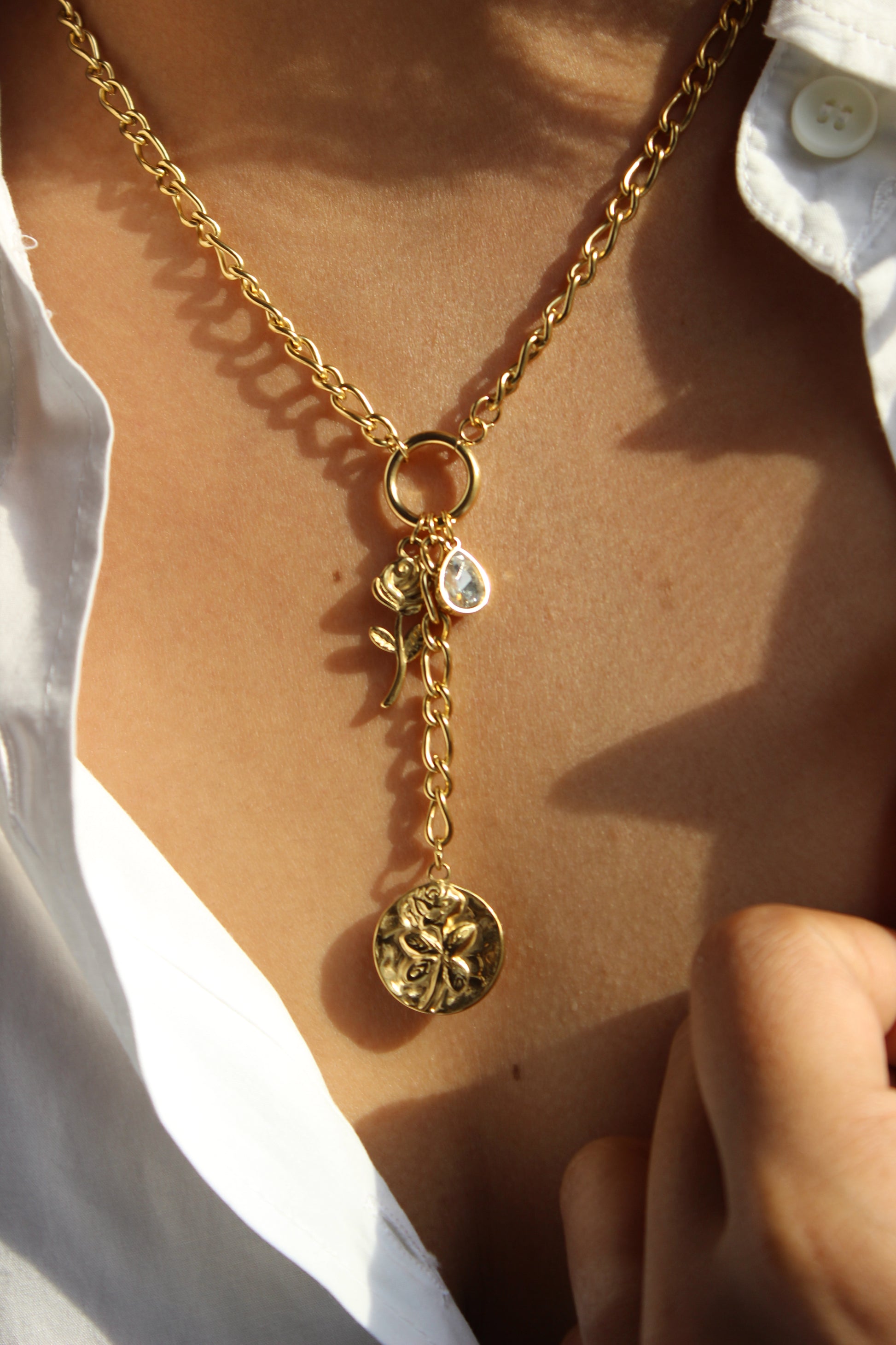 Chrysalis Dream Necklace on a model's neck, casting a shadow