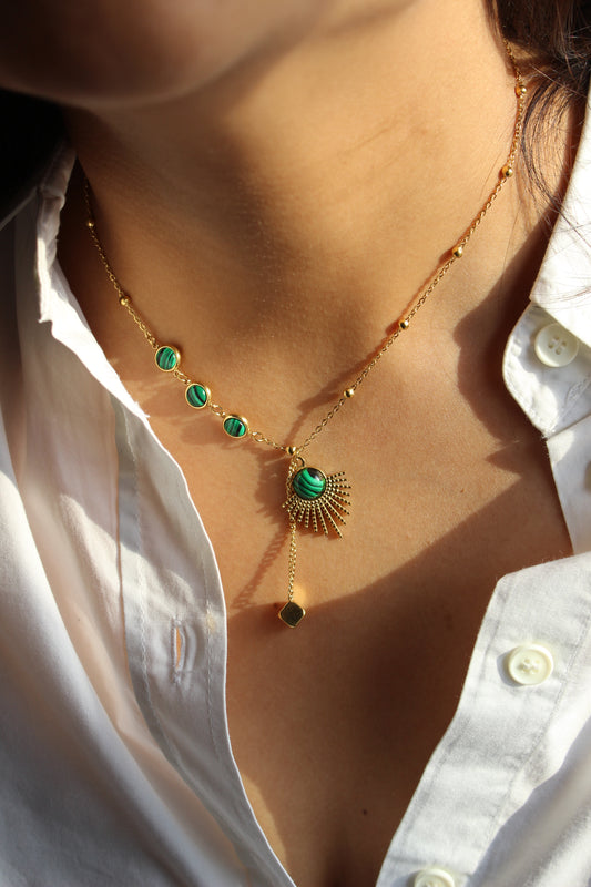 MalaSol Necklace on a person wearing a white shirt
