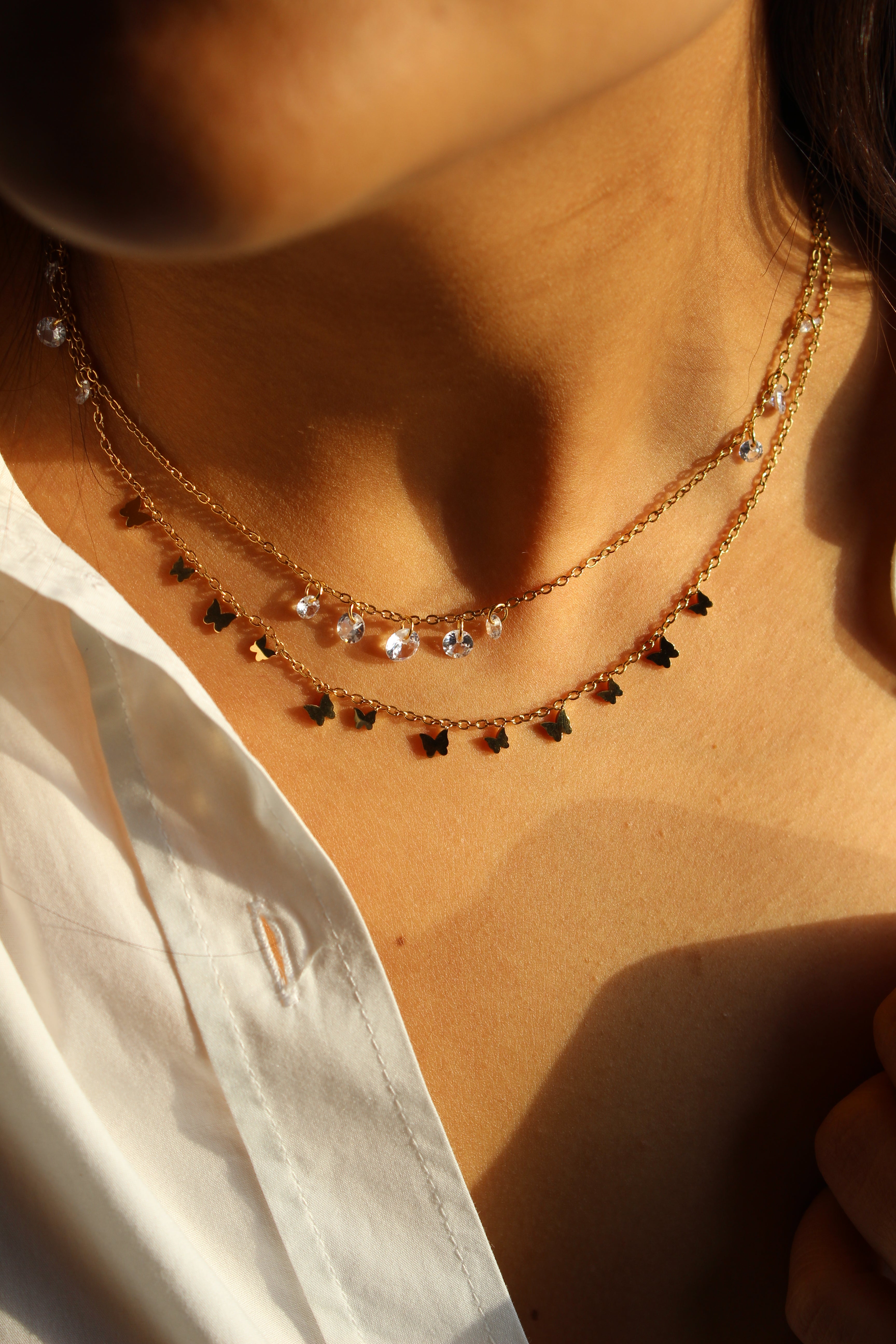 Eternal Glide Layered Necklace on a textured surface