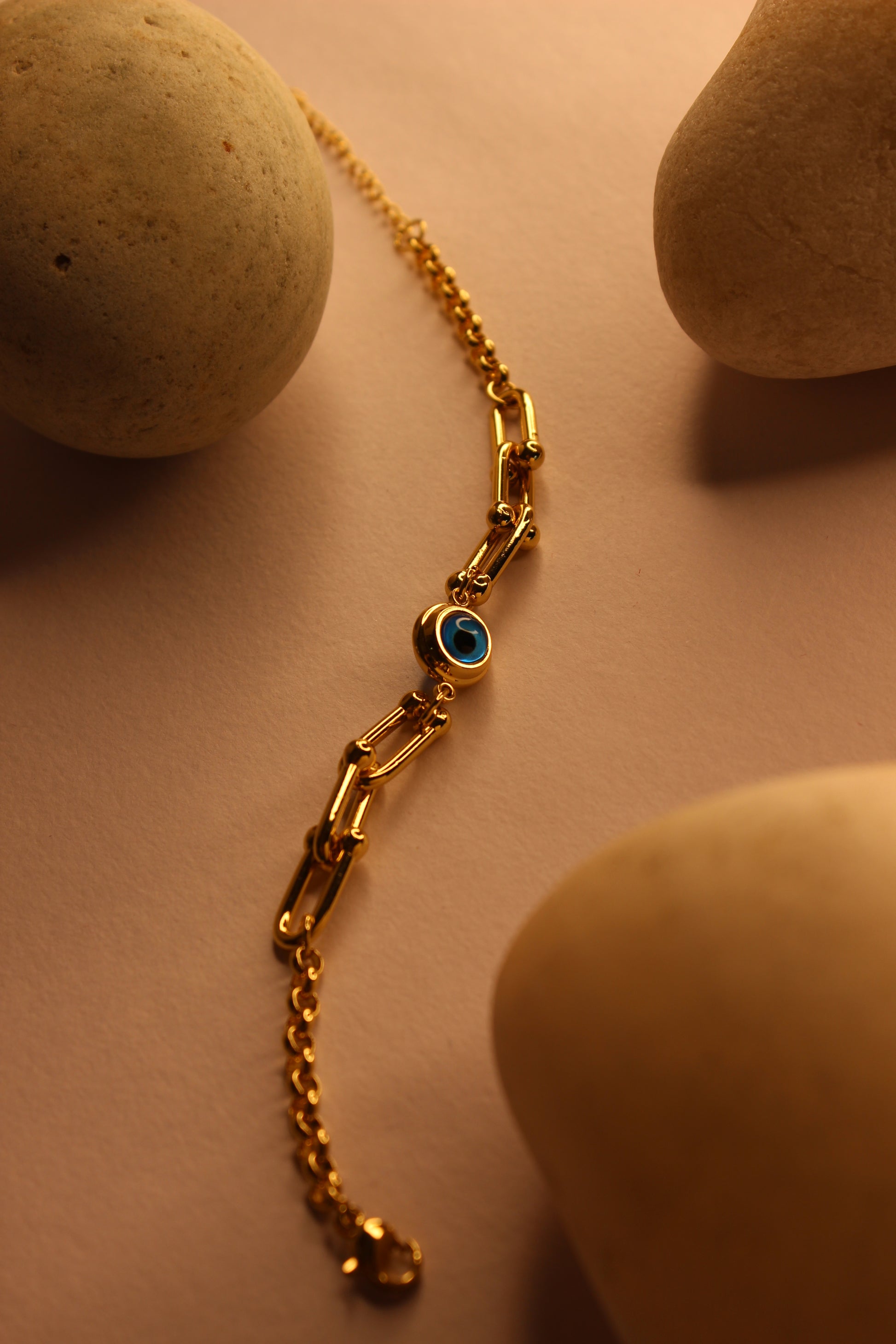 Pelora Bracelet on a beige surface