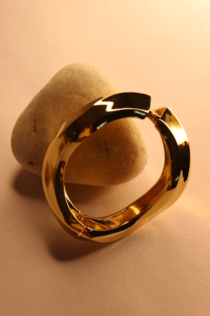 Vetra Bracelet on a stone surface with a warm beige background