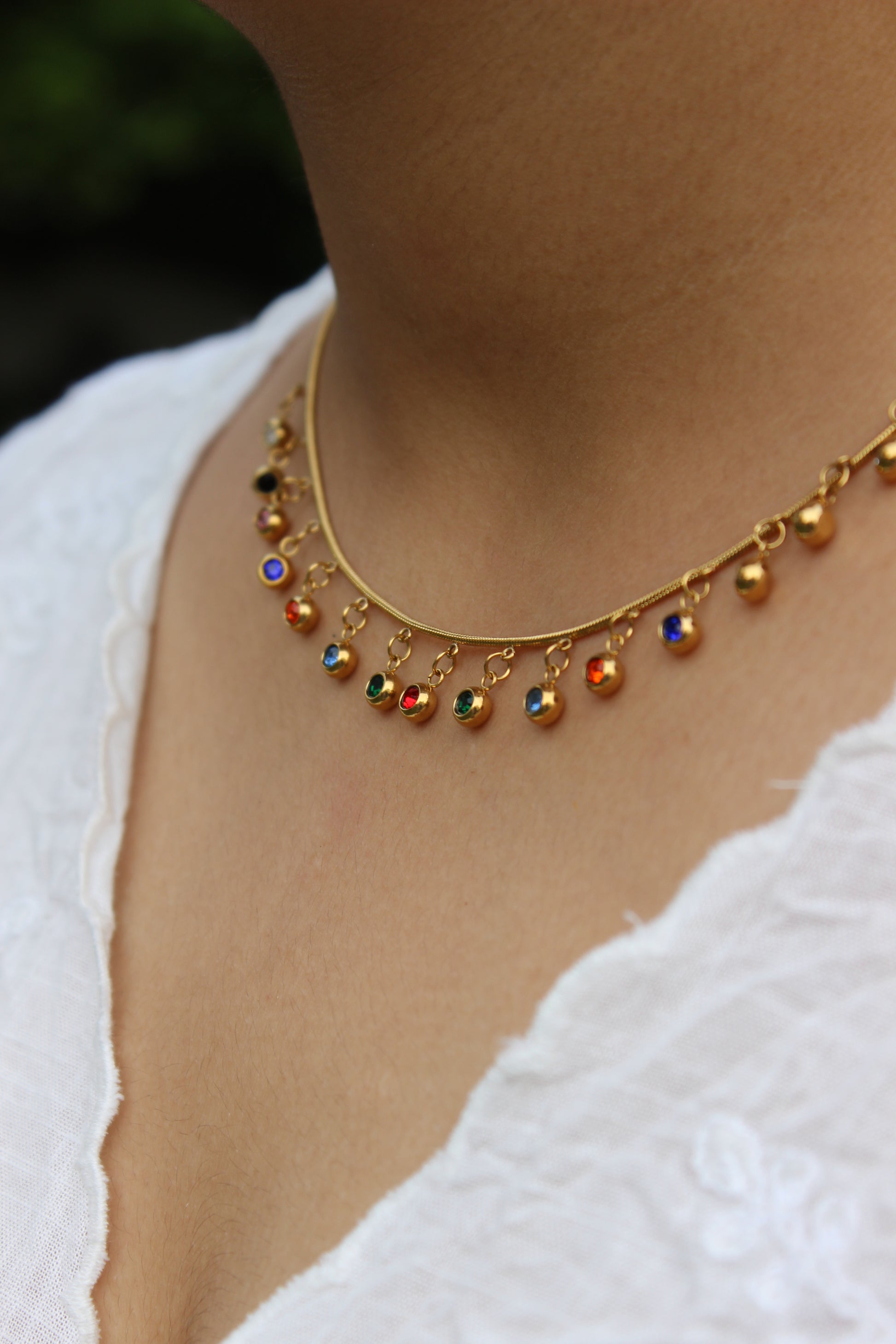 Chroma Dots Necklace on a model's neck 