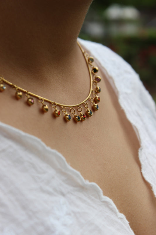 Chroma Dots Necklace on a model wearing a white sleeveless top