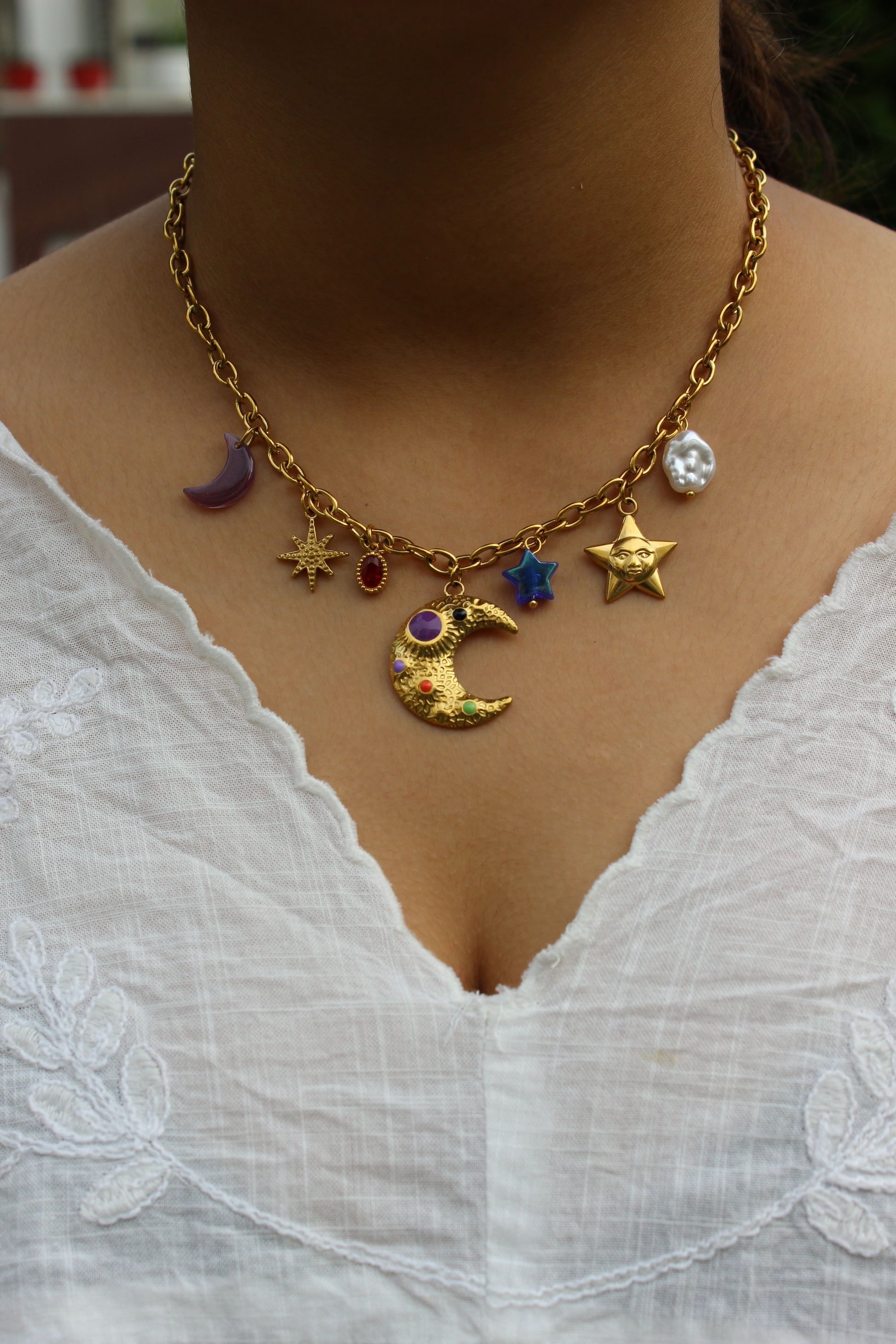 Lunar Spells Charms Necklace on model's neck