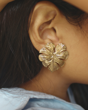 Close-up of a model wearing a Leafora Earrings